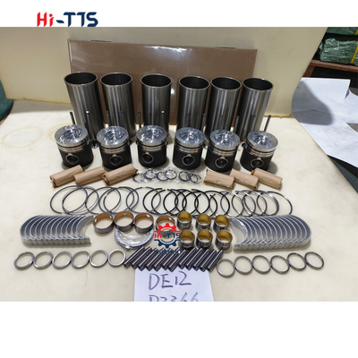 DE12 Motor de excavadora Nombre de la pieza Kit de revestimiento del cilindro Completo con revestimiento de las válvulas de anillo de pistón