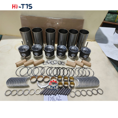 DE12 Motor de excavadora Nombre de la pieza Kit de revestimiento del cilindro Completo con revestimiento de las válvulas de anillo de pistón