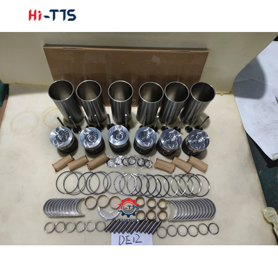 DE12 Motor de excavadora Nombre de la pieza Kit de revestimiento del cilindro Completo con revestimiento de las válvulas de anillo de pistón